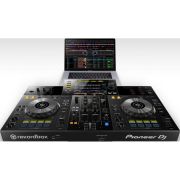 vista del controlador dj Pioneer XDJ-RR en color negro con un macbook pro al fondo